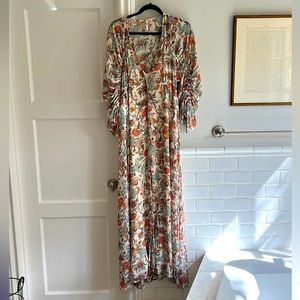 Free People deep V-Neck floral Maxi dress Size Medium.